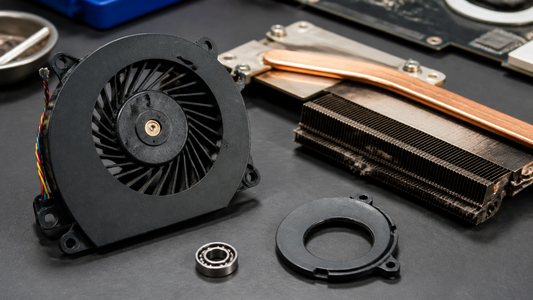 Simulated professional repair scene for Gaming Laptop Cooling System: Worn fan bearing