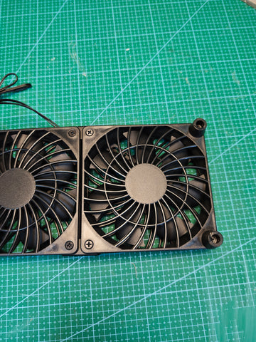 Rear view of the dual USB cooling fan unit, right fan and corner feet
